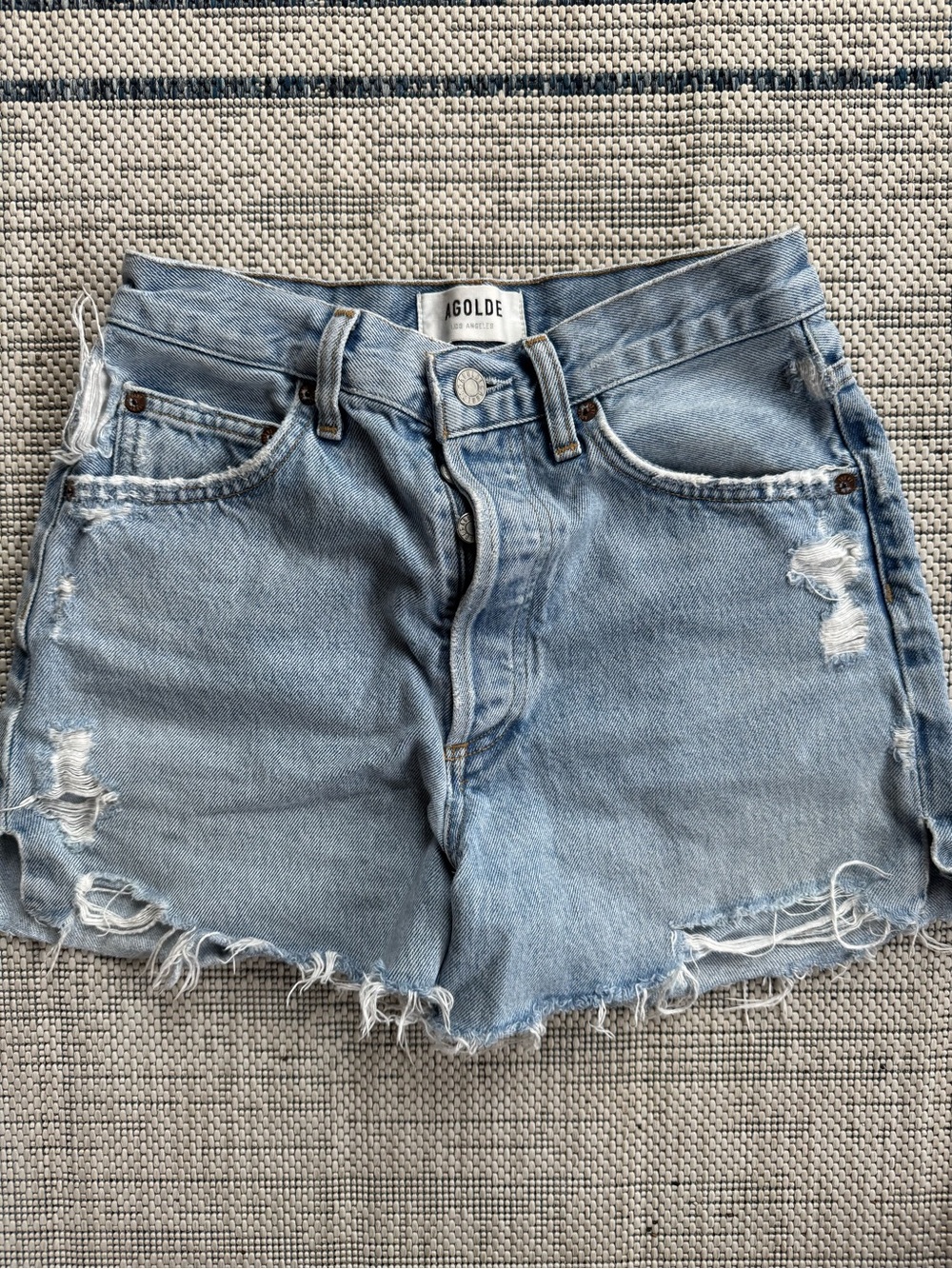 Agolde Faded Light Blue High-Rise Distressed Denim Shorts